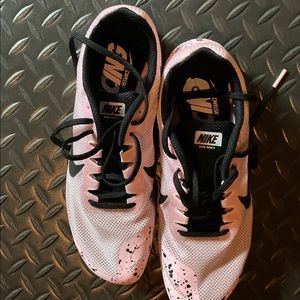 Nike Women’s racing shoes with removable spikes